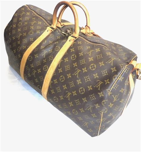 used lv duffle bag|lv duffle bag vintage.